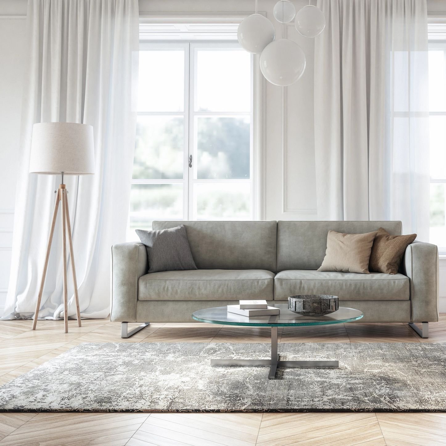 grey couch on area rug in living room - Rickway Carpet in North Mankato, MN